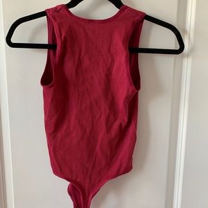 urban outfitters pink body suit!
